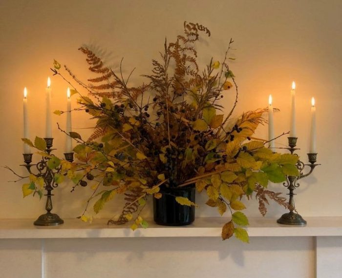 Autumn decoration for the mantlepiece with candles.